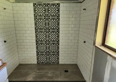 bathroom tiling progress in Beveridge home